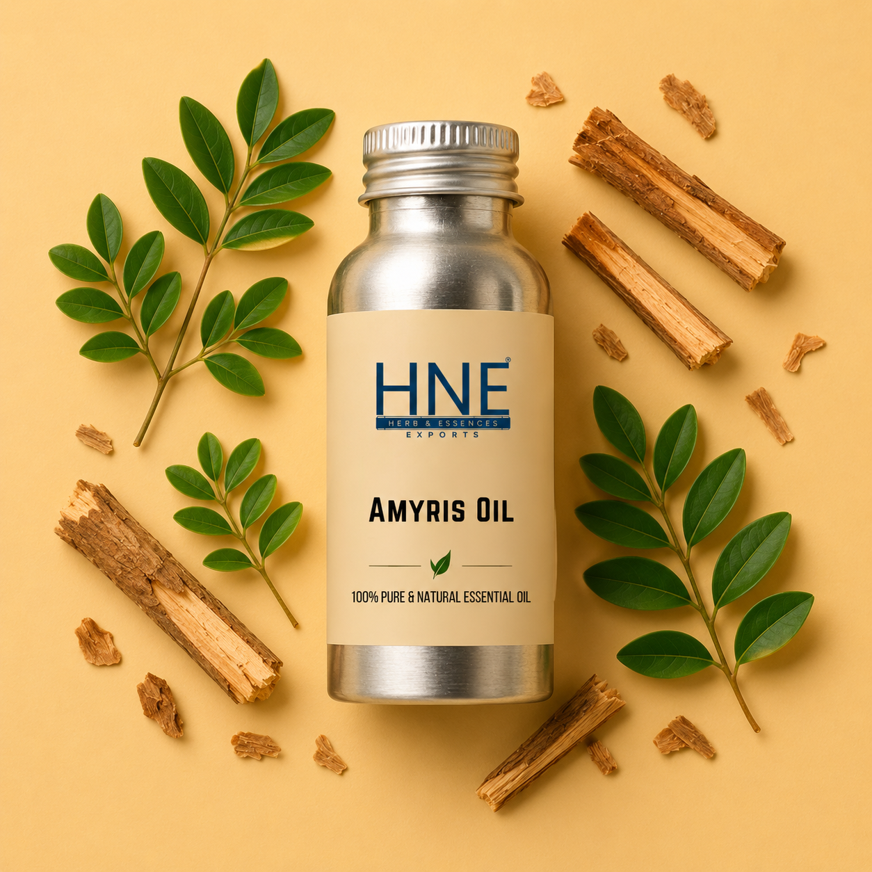 Bottle of HNE Amyris Oil with leaves and sticks on a beige background