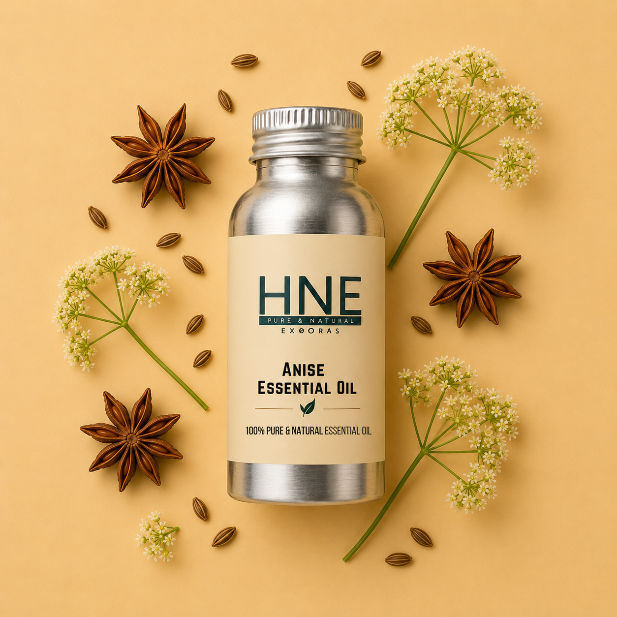 Anise essential oil bottle with star anise and anise flowers on a beige background