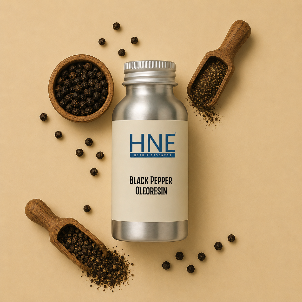 Silver bottle labeled 'HNE' with black pepper oleoresin on a beige background