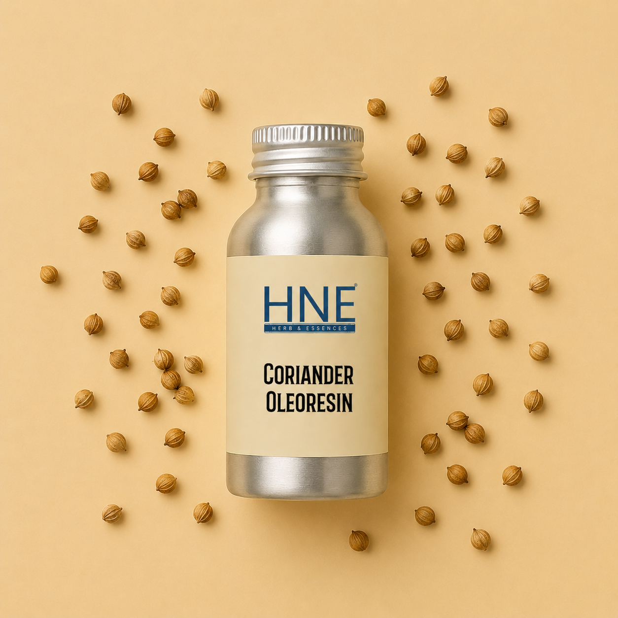 Bottle of HNE Coriander Oleoresin surrounded by coriander seeds on a beige background
