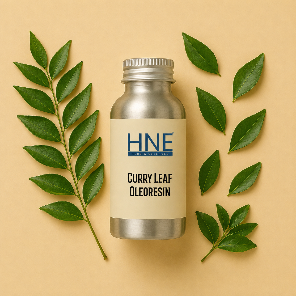 Bottle of HNE Curry Leaf Oleoresin with curry leaves on a beige background