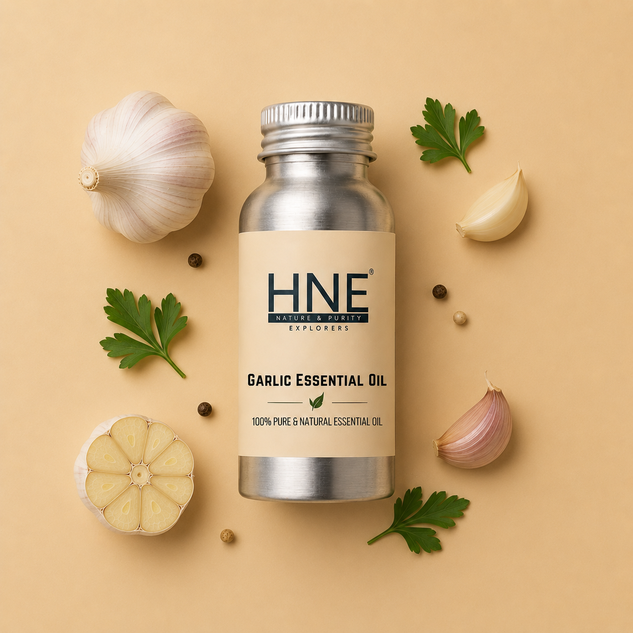 Bottle of HNE Garlic Essential Oil with garlic bulbs and leaves on a beige background
