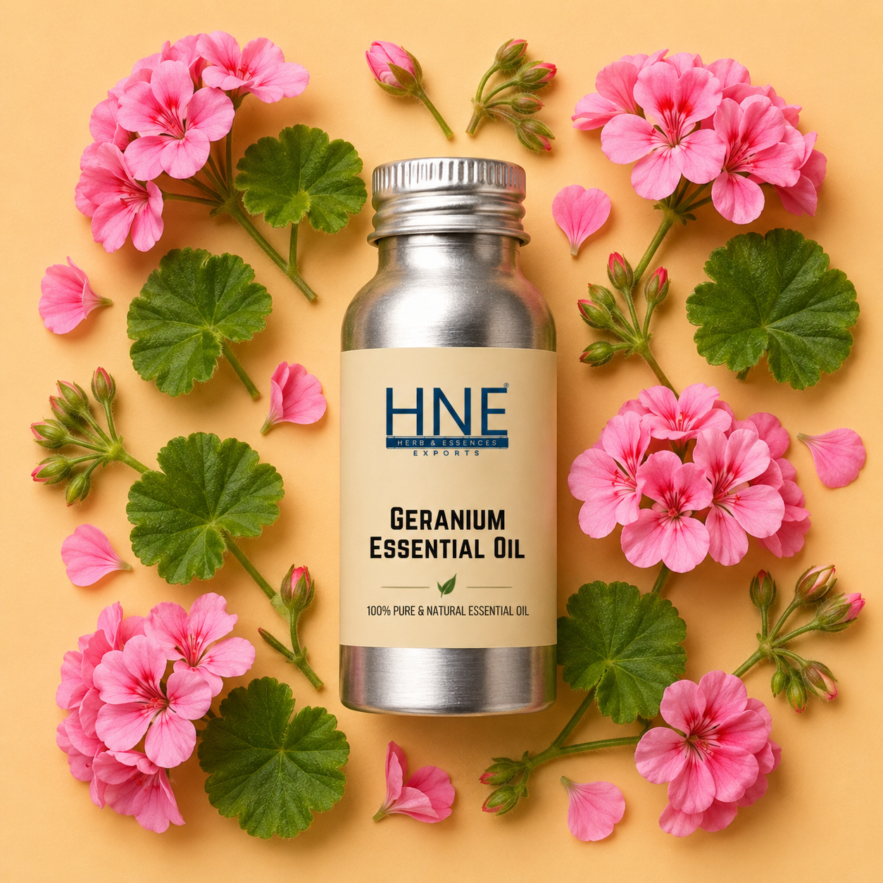HNE Geranium Essential Oil bottle surrounded by pink flowers and green leaves on a yellow background