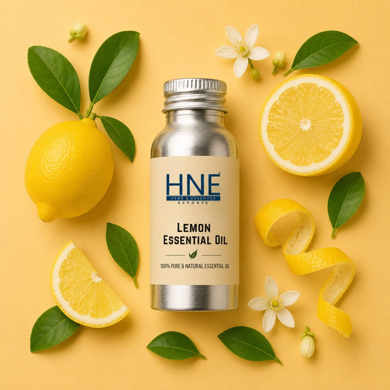 Bottle of HNE Lemon Essential Oil surrounded by lemons and leaves on a yellow background
