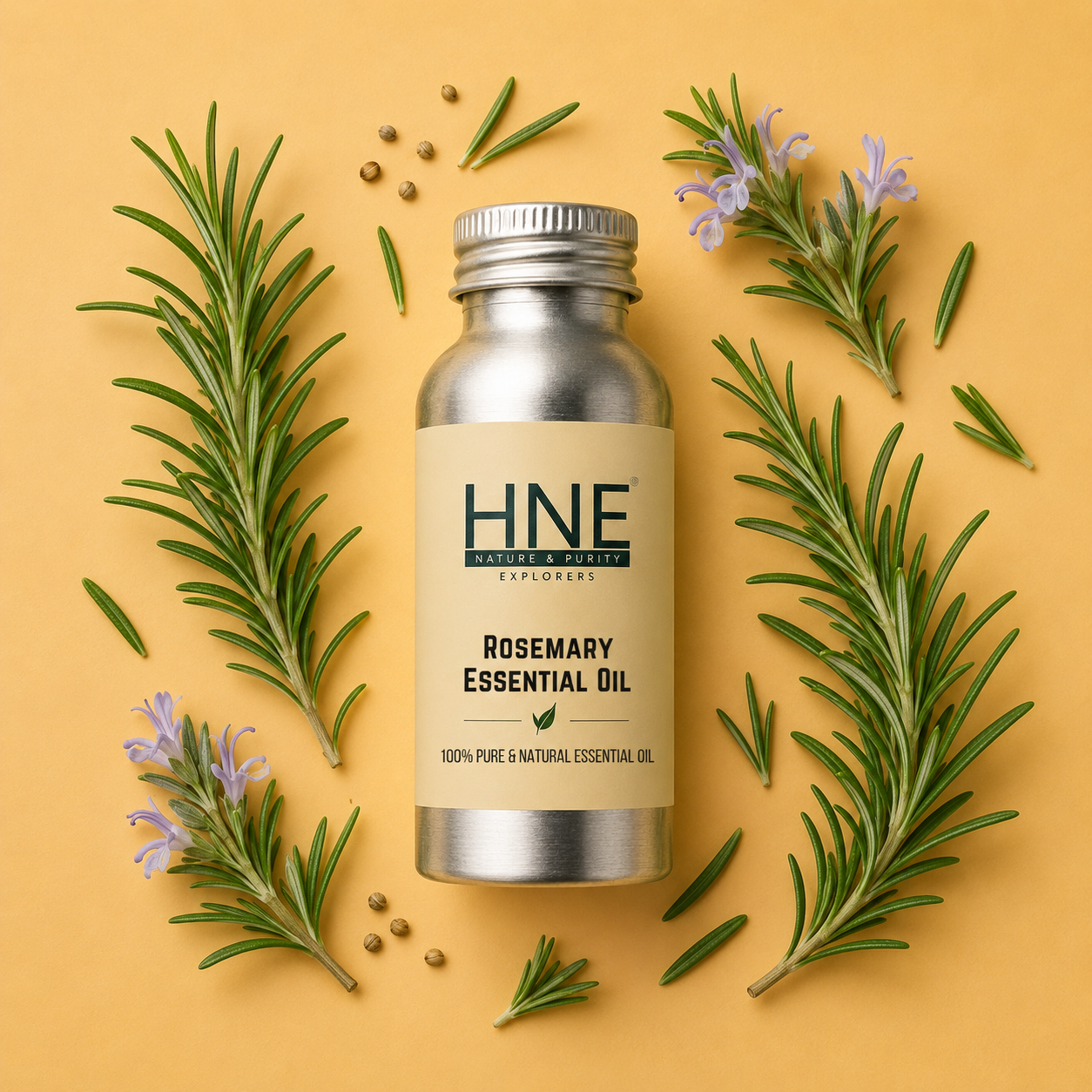 Bottle of HNE Rosemary Essential Oil surrounded by rosemary leaves on a yellow background