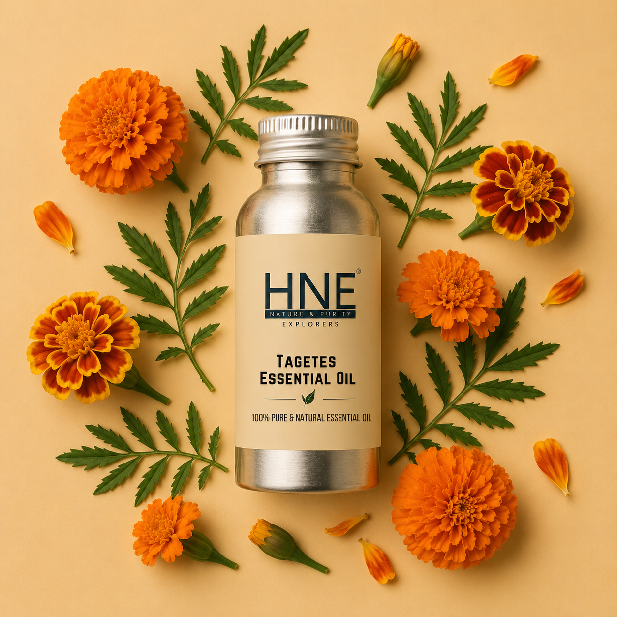 Bottle of HNE Tagetes Essential Oil surrounded by marigold flowers on a beige background