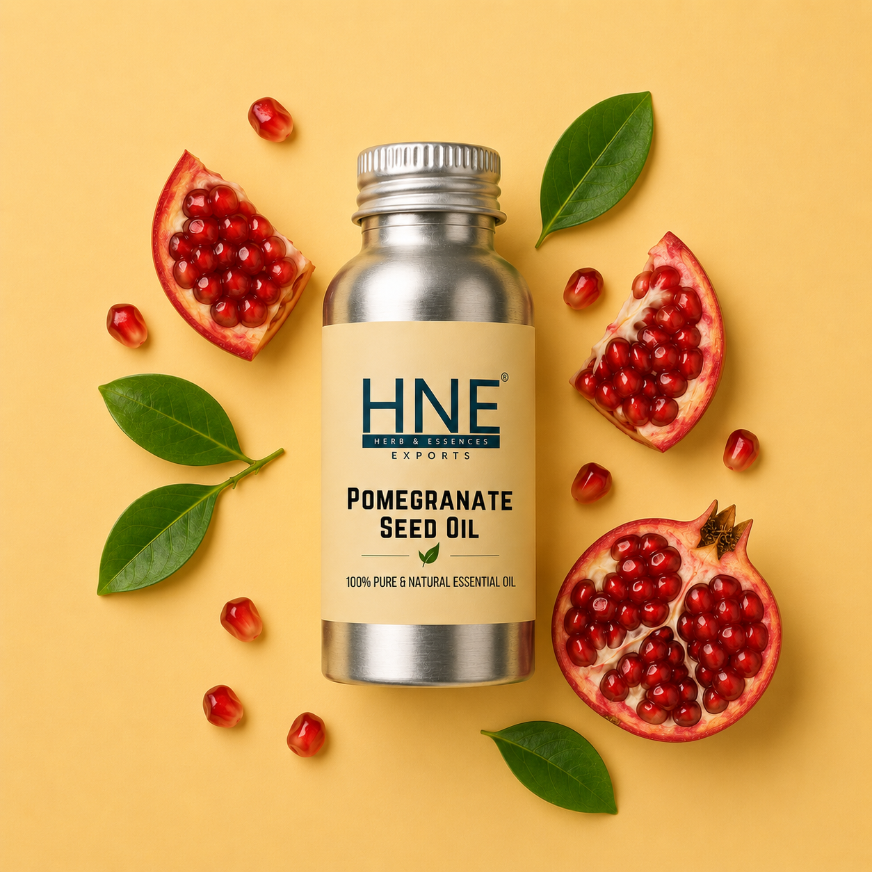 Bottle of HNE Pomegranate Seed Oil with pomegranate fruits and leaves on a yellow background